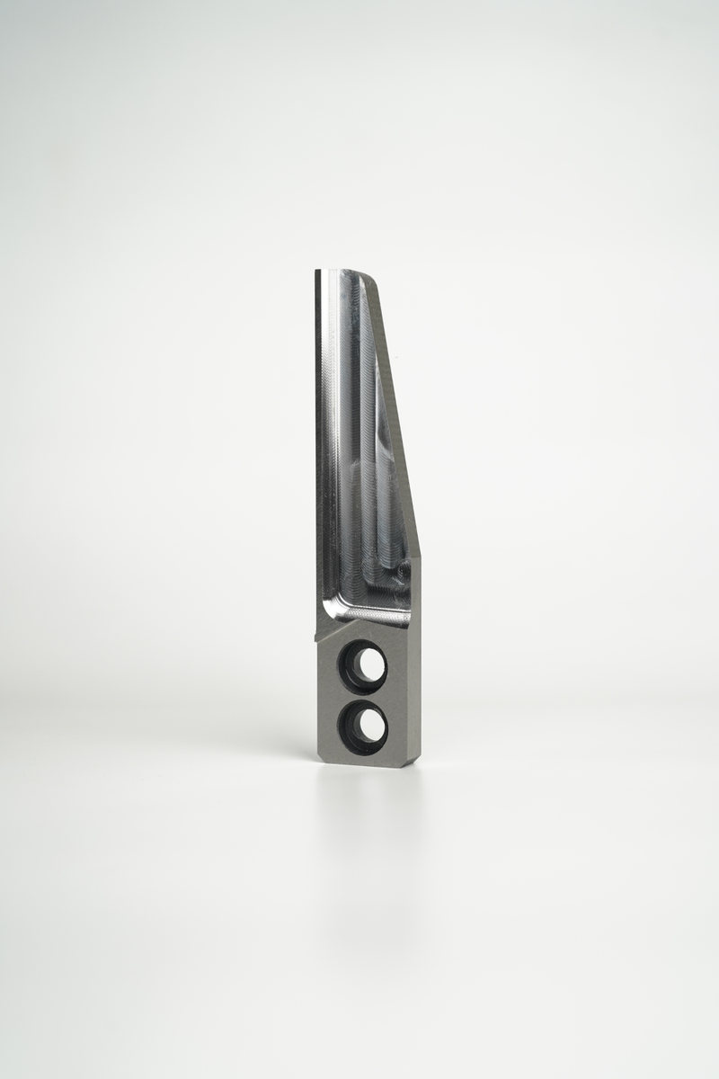 Finished pelletizer knife with visible working and mounting areas